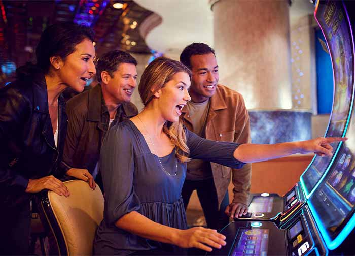 Group of people playing slot